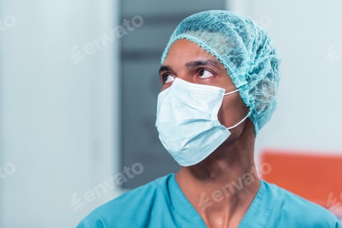 Preview: Portrait shot of a young dentist in the dentistry room