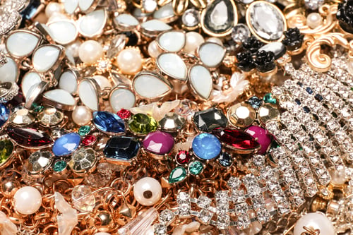 Preview: Different stylish jewelry as background, closeup view