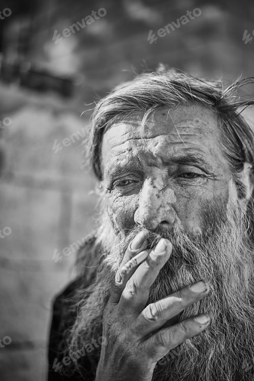 Preview: Close-up shot of an old homeless man's face