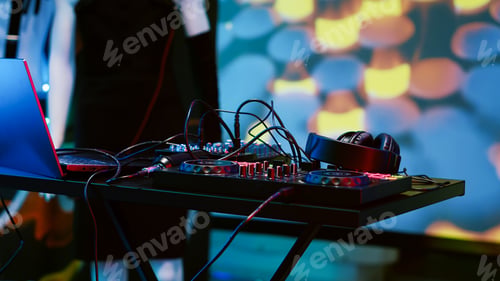 Preview: Empty DJ mixing panel at funky club