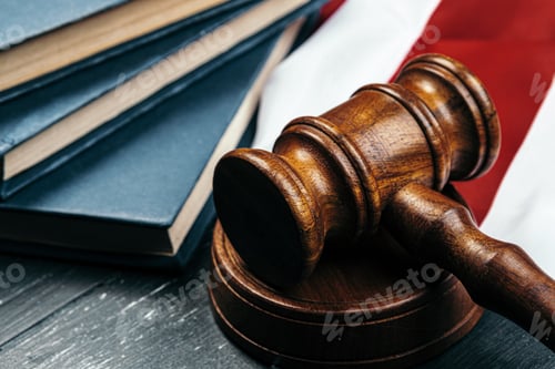 Preview: Judge gavel on the background of the flag united states of America