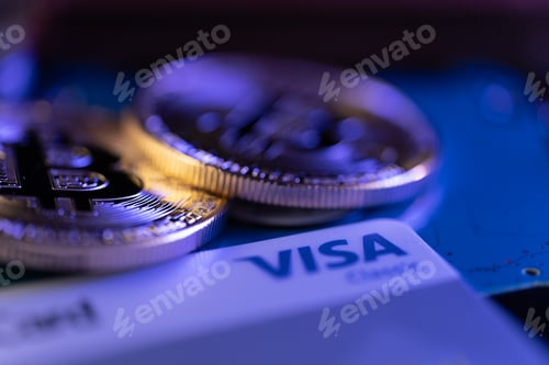 Preview: Golden coin with bitcoin symbol and Visa card
