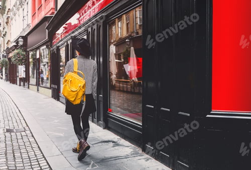 Preview: Street look of tourist woman in Ljubljana. Travel to Europe.