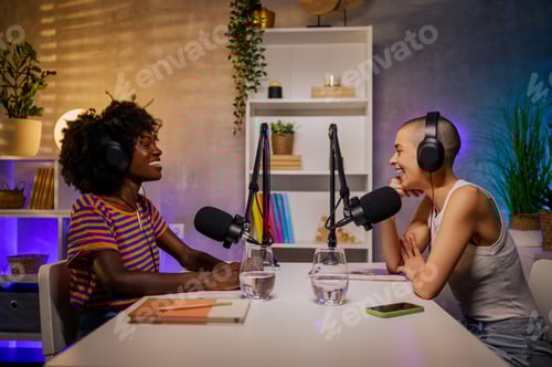 Preview: Two content creators are sitting in a home recording studio and making a podcast