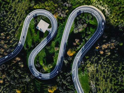 Preview: Aerial view of winding curved road with helicopter parking in Italy