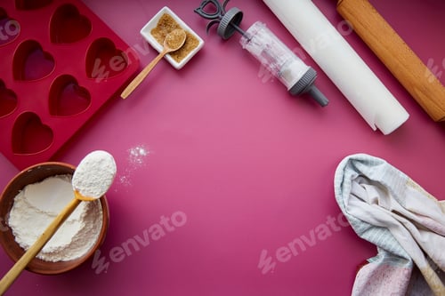 Preview: Preparing for baking: heart-shaped silicone mold, rolling pin, confectionery syringe, glaze, flour