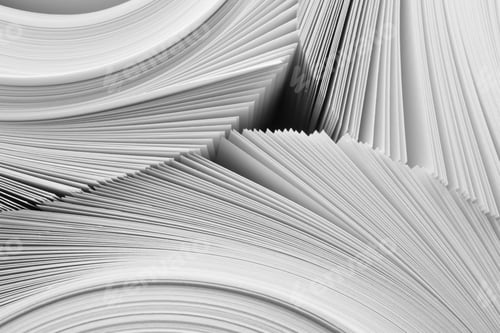 Preview: Rolled white paper sheets as background, closeup