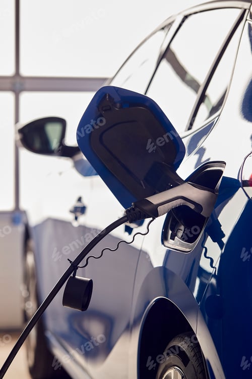 Preview: Charging Cable Attached To Environmentally Friendly Zero Emission Electric Car In Garage