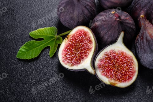 Preview: Fresh ripe figs on a dark background
