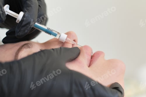 Preview: Cosmetologist expertly delivers lip injection. In the beauty realm, decisions weigh desire against