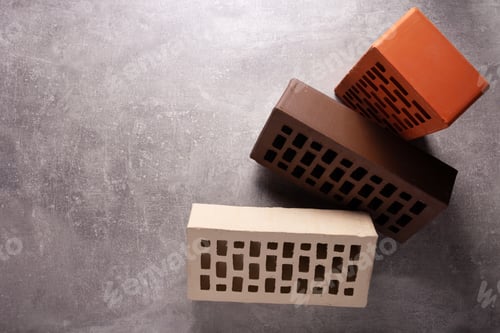 Preview: Construction brick at cement background on wall. Bricks at concrete floor texture