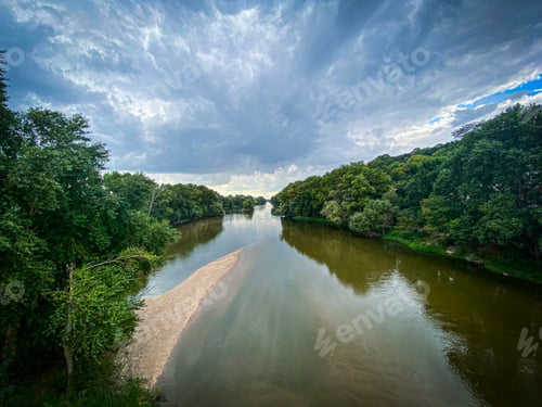 Preview: The Loire rivers next Tours, summer view with clouds and green foliages, Loire valley, France