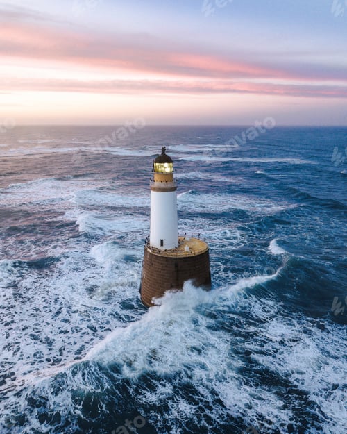 Preview: Waves hitting a lighthouse in Scotland