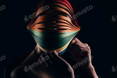 Preview: woman wearing colored quilling paper on head isolated on black