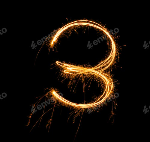 Preview: Fireworks numbers 3 Burning sparkler Numbers isolated on black background. Sparkler firework light