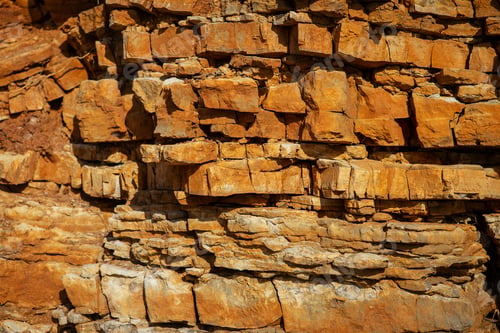Preview: Surface, background, texture of a rock with a brownish-red tint.