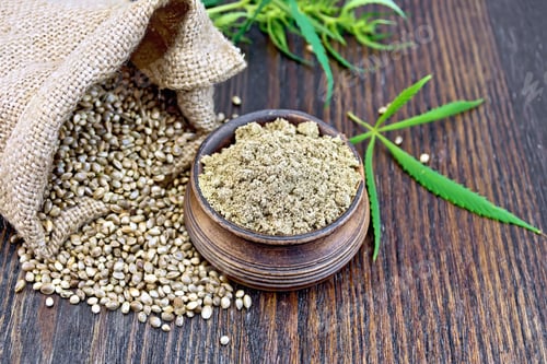 Preview: Flour hemp in bowl with grain and bag on board