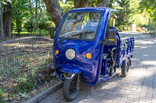 Preview: Three wheels motorcycle with cabin. Blue car with trailer for one