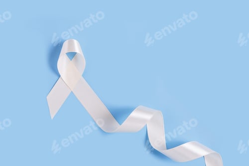 Preview: White bone cancer awareness ribbon on blue background