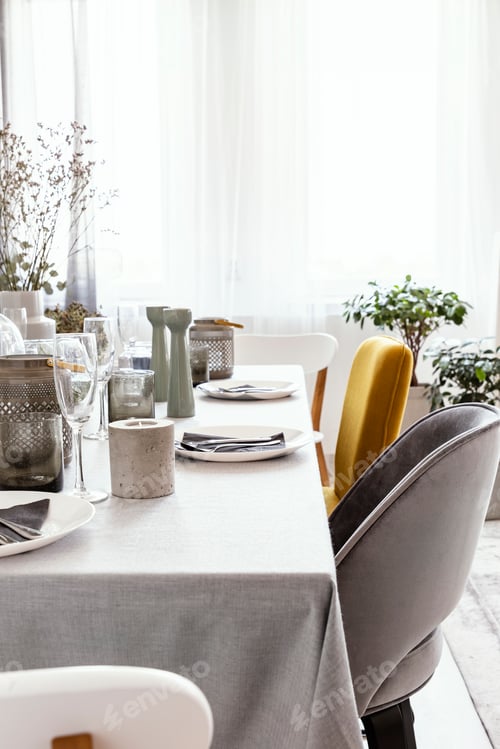 Preview: Real photo of table with dinnerware, candle and grey and yellow