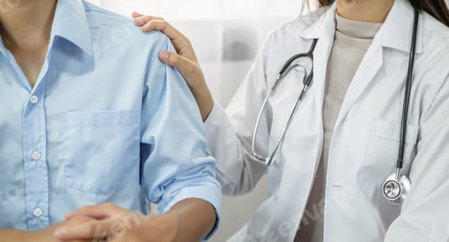Preview: The female doctor uses a friendly hand to hold the touch shoulder to give confidence and show care