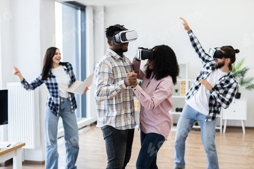 Preview: Group of friends exploring virtual reality experiences in a modern office