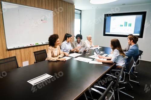 Preview: Happy diverse business colleagues meeting, working in modern office