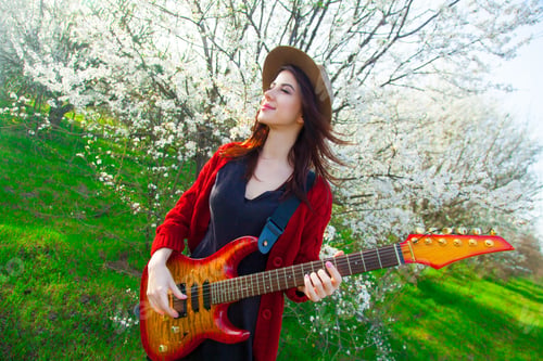 Preview: portrait of young woman with guitar