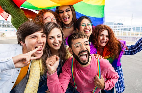 Preview: LGBT community people with rainbow flag celebrating gay pride day festival