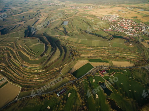 Preview: Aerial view of majestic landmark with green fields on tiers, Germany