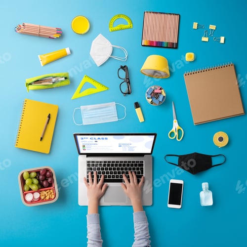 Preview: Flat lay top view of face mask and school supplies, distance learning and coronavirus concept