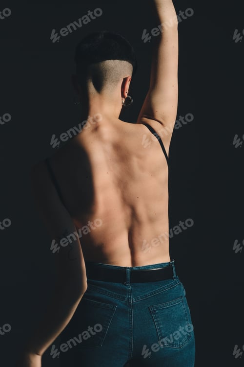 Preview: Attractive Girl With Perfect Body And Short Hair Posing In Jeans In Sunlight