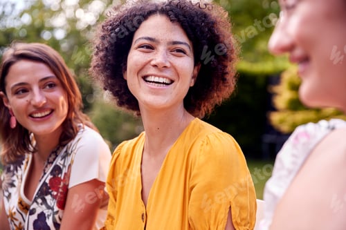 Preview: Three Female Friends Sitting Outdoors Together And Catching Up In Summer Garden At Home