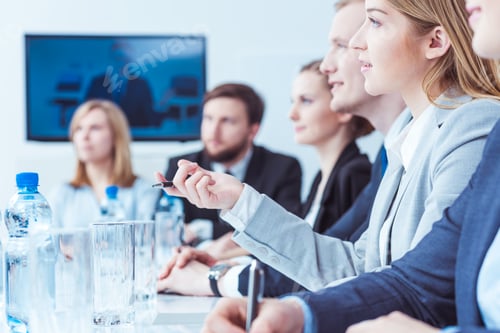 Preview: Young lawyer discussing company strategy