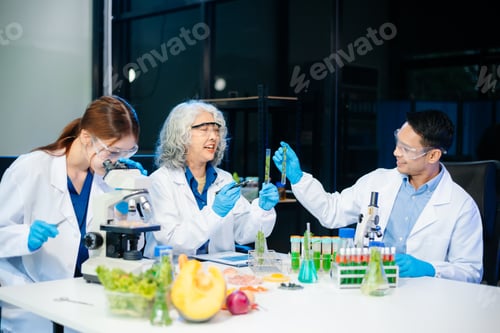 Preview: Team of scientists examining food samples in a lab with microscopes. Perfect for themes