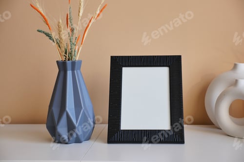 Preview: Black frame mockup in a living room