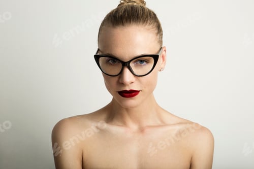 Preview: Woman with Glasses and Red Lipstick Posing
