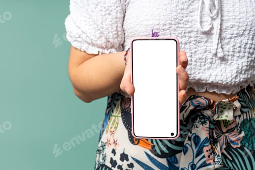 Preview: Woman holding modern smartphone with blank screen for mockup