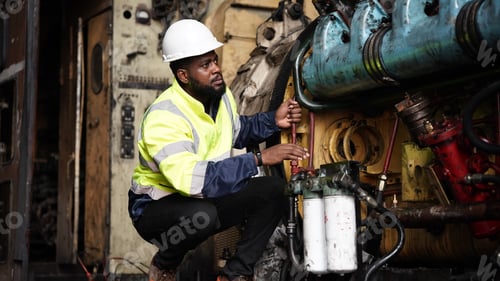 Preview: Portrait of maintenance engineer or apprentice in workshop of railway engineering facility