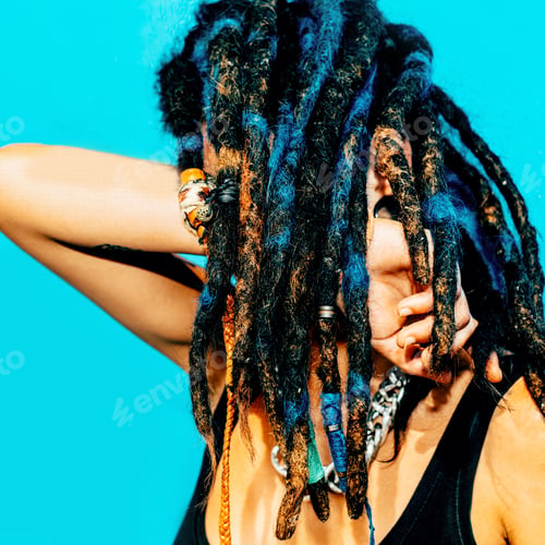 Preview: Rasta Latino Girl with dreadlocks, piercings, tattoos and stylis