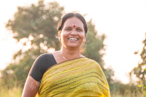 Preview: Happy Indian woman running in the meadow, Woman enjoying nature.