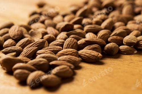 Preview: Snack. Heap of nuts on the table