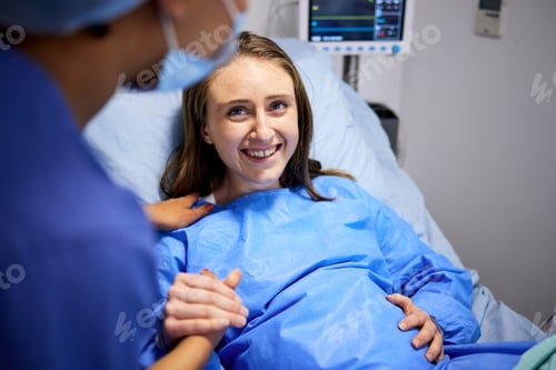 Preview: Pregnant woman, labor and hospital with holding hands, bed and support from nurse, excited smile an