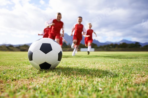 Preview: The ball is there to be won. Shot of a childrens soccer team on the field.