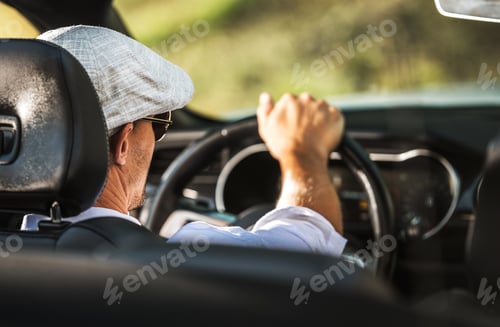 Preview: Men Driving Convertible Car