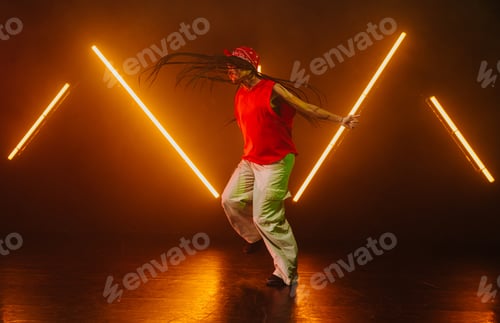 Preview: Hip hop dancer dancing in a cool studio with neon lights.