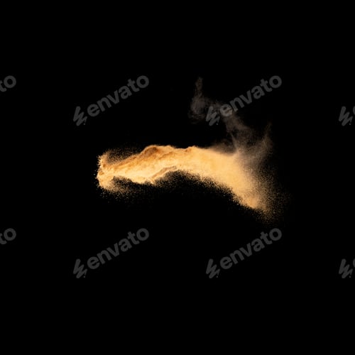 Preview: Sand explosion isolated on black background. Freeze motion of sandy dust splash.