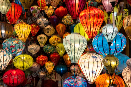 Preview: Vibrant, intricately patterned lanterns in assorted shapes and colors in Vietnam market.