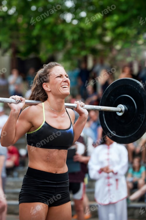 Preview: Woman lifting weights