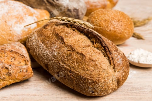 Preview: Homemade natural breads. Different kinds of fresh bread as background